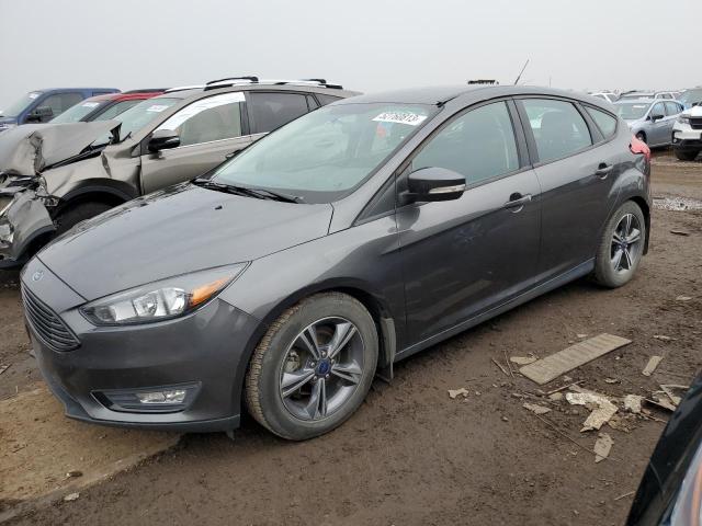 FORD FOCUS SE 2016 with VIN 1FADP3KE4GL282018 - Photo from auction