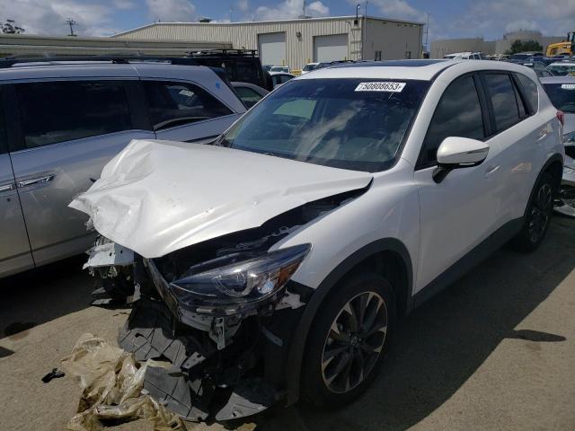 MAZDA CX-5 GT 2016 with VIN JM3KE4DY4G0887511 - Photo from auction
