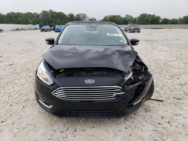 Photo 5 from auction – 2016 FORD FOCUS TITA with VIN 1FADP3N29GL239604