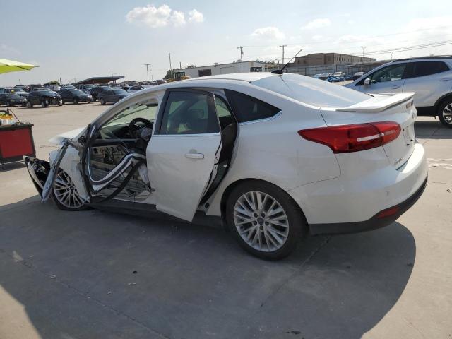 Photo 2 from auction – 2015 FORD FOCUS TITA with VIN 1FADP3J29FL240272