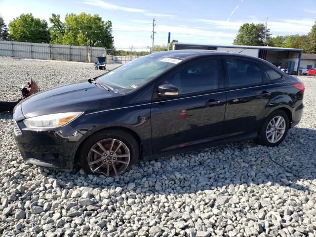FORD FOCUS SE 2015 with VIN 1FADP3F23FL227381 - Photo from auction