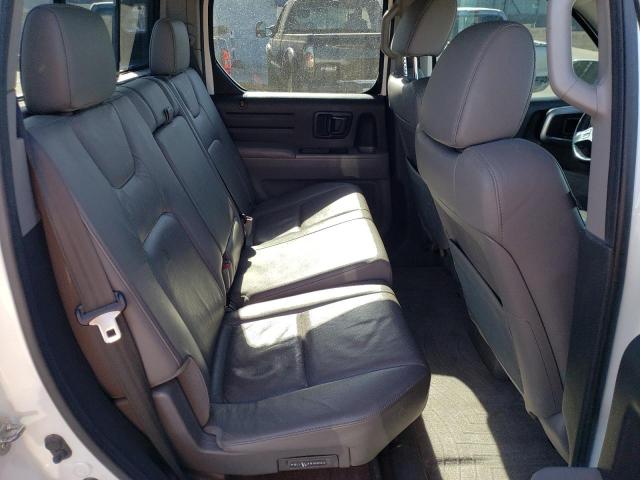 Photo 10 from auction – 2011 HONDA RIDGELINE with VIN 5FPYK1F59BB008521