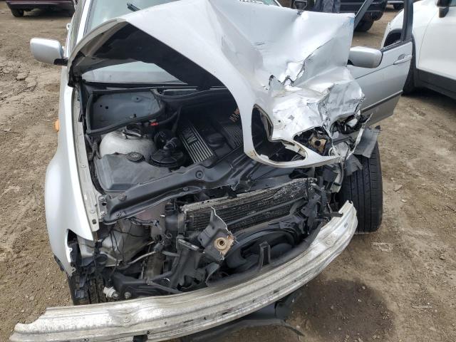 Photo 11 from auction – 2005 BMW 325 I with VIN WBAEV33405KX10046