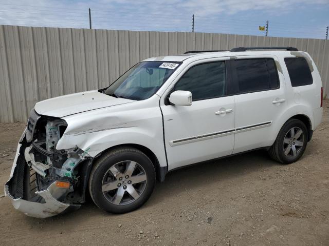 HONDA PILOT TOUR 2012 with VIN 5FNYF4H90CB059521 - Photo from auction