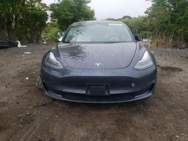 Photo 5 from auction – 2022 TESLA MODEL 3 with VIN 5YJ3E1EA3NF348597