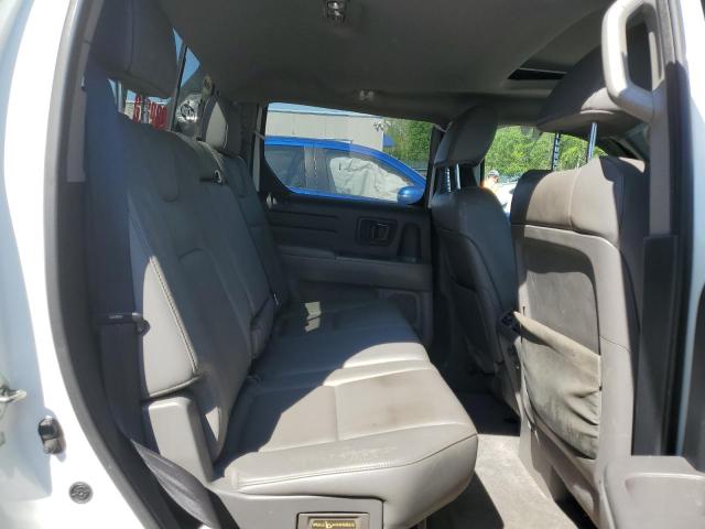 Photo 10 from auction – 2014 HONDA RIDGELINE with VIN 5FPYK1F52EB012768