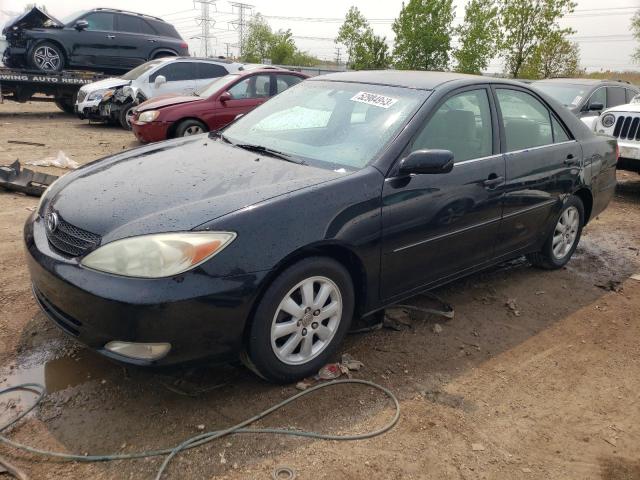 TOYOTA CAMRY LE 2003 with VIN 4T1BE30K33U125631 - Photo from auction