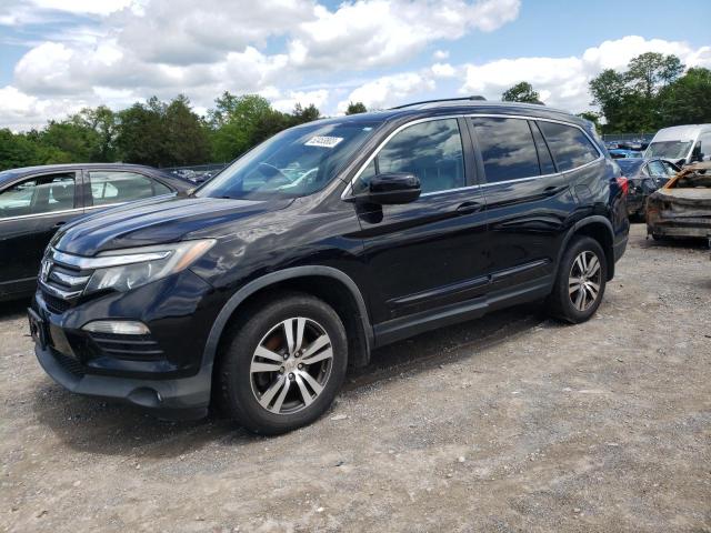 HONDA PILOT EXLN 2016 with VIN 5FNYF6H77GB097229 - Photo from auction