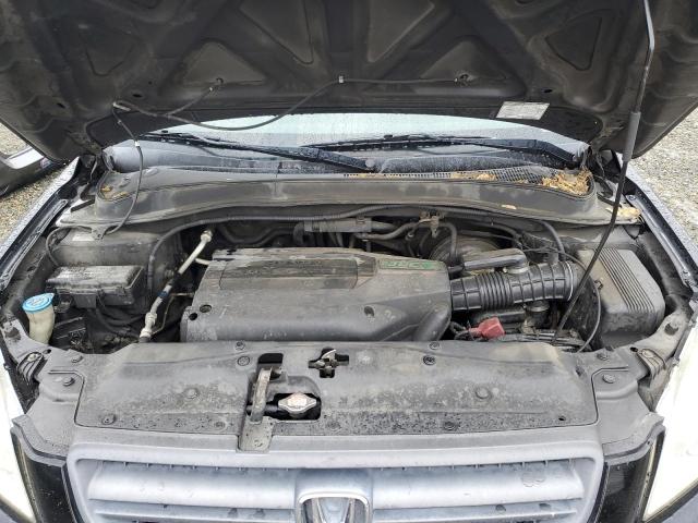 Photo 12 from auction – 2003 HONDA PILOT EX with VIN 2HKYF18423H551861