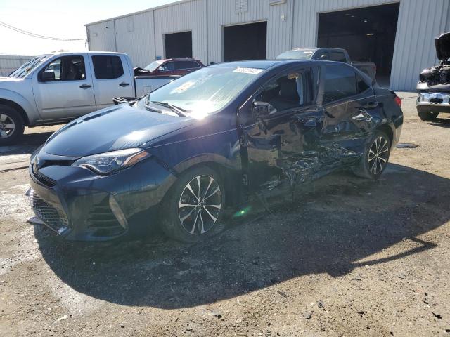 TOYOTA COROLLA L 2018 with VIN 5YFBURHE0JP823567 - Photo from auction