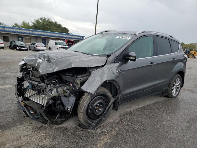 FORD ESCAPE TIT 2017 with VIN 1FMCU0J94HUC13192 - Photo from auction