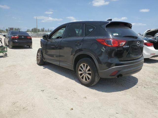 Photo 2 from auction – 2013 MAZDA CX5 with VIN JM3KE2CE3D0124855