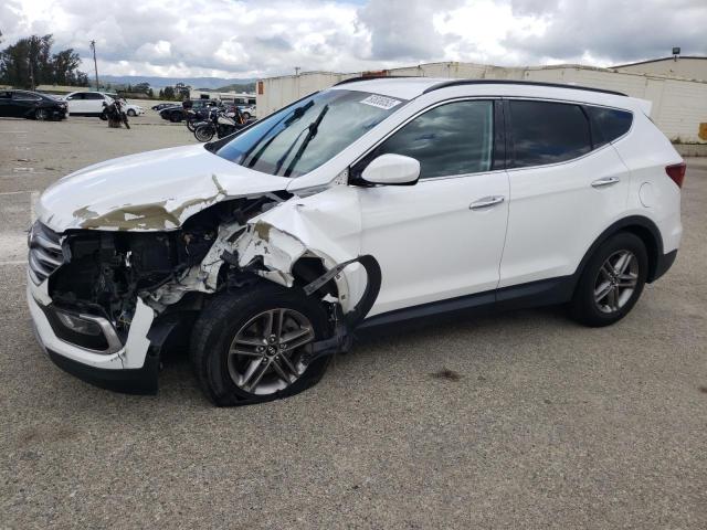 HYUNDAI SANTA FE S 2017 with VIN 5NMZU3LB9HH005302 - Photo from auction