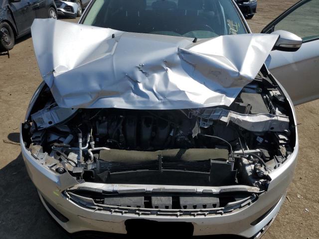 Photo 11 from auction – 2016 FORD FOCUS SE with VIN 1FADP3F24GL220103