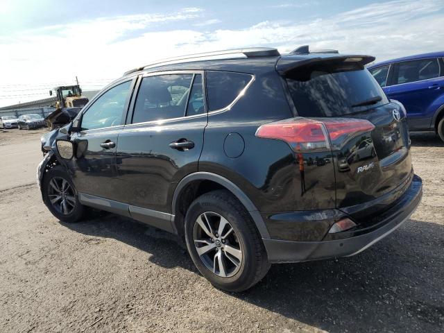 Photo 2 from auction – 2017 TOYOTA RAV4 XLE with VIN 2T3WFREV5HW351074