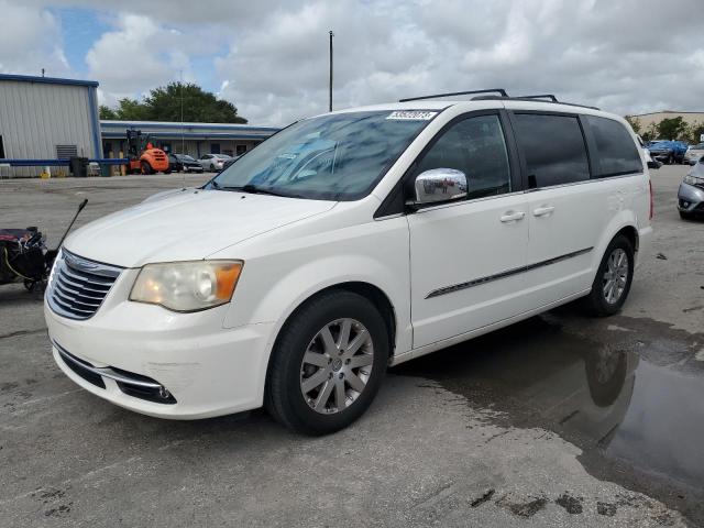 CHRYSLER TOWN & COU 2011 with VIN 2A4RR8DG8BR764300 - Photo from auction