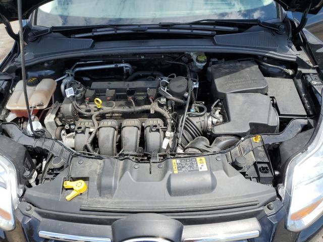 Photo 11 from auction – 2014 FORD FOCUS SE with VIN 1FADP3K27EL319209