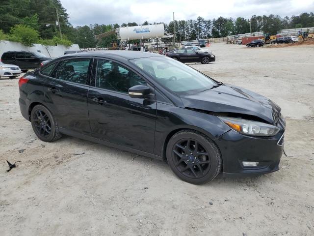 Photo 4 from auction – 2016 FORD FOCUS SE with VIN 1FADP3F24GL314384