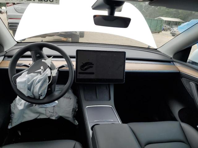 Photo 8 from auction – 2023 TESLA MODEL Y with VIN 7SAYGDEE3PA060909