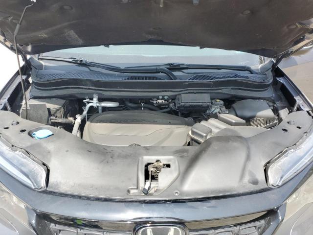 Photo 12 from auction – 2021 HONDA PASSPORT E with VIN 5FNYF8H52MB005143
