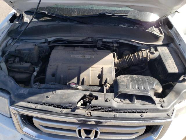 Photo 11 from auction – 2011 HONDA RIDGELINE with VIN 5FPYK1F59BB008521