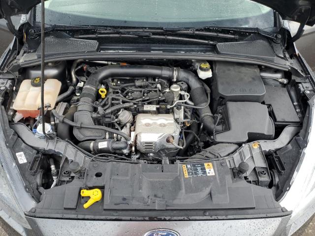 Photo 11 from auction – 2018 FORD FOCUS SE with VIN 1FADP3FE2JL319388