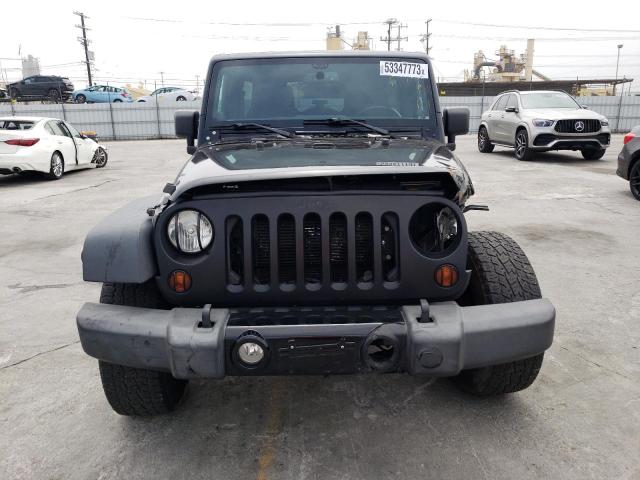 Photo 5 from auction – 2013 JEEP WRANGLER U with VIN 1C4BJWDG5DL636790