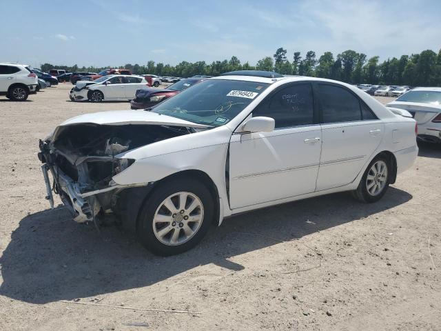 TOYOTA CAMRY LE 2003 with VIN JTDBF32K630145815 - Photo from auction