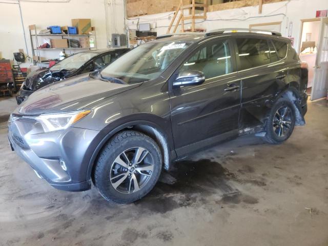 TOYOTA RAV4 XLE 2017 with VIN 2T3RFREV1HW675734 - Photo from auction