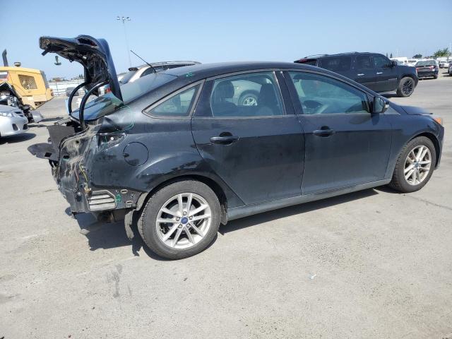 Photo 3 from auction – 2015 FORD FOCUS SE with VIN 1FADP3F21FL233972