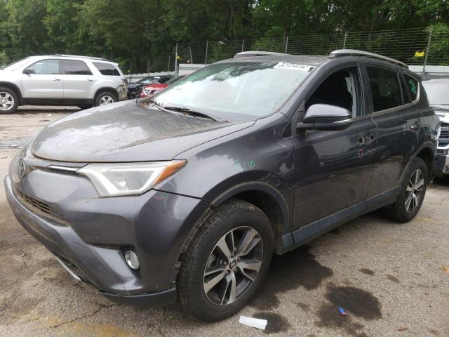 TOYOTA RAV4 XLE 2017 with VIN 2T3RFREVXHW588561 - Photo from auction