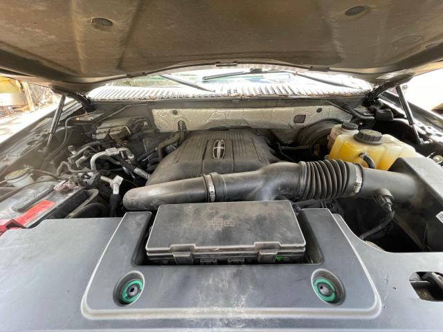 Photo 8 from auction – 2015 LINCOLN NAVIGATOR with VIN 5LMJJ3HT1FEJ08195