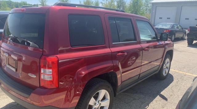 Photo 4 from auction – 2014 JEEP PATRIOT with VIN 1C4NJRAB7ED569015