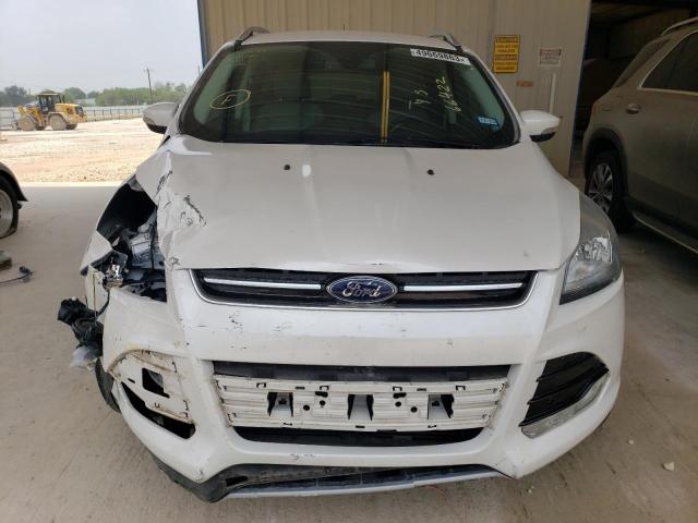 Photo 5 from auction – 2016 FORD ESCAPE TIT with VIN 1FMCU0J98GUB23431