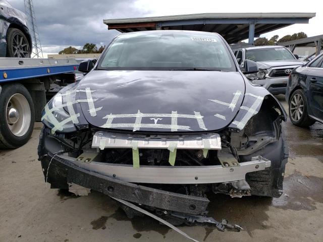 Photo 5 from auction – 2021 TESLA MODEL Y with VIN 5YJYGAEEXMF214025