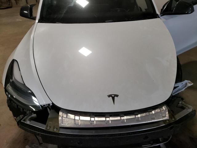 Photo 11 from auction – 2022 TESLA MODEL Y with VIN 7SAYGDEF8NF534863