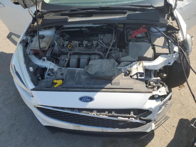 Photo 11 from auction – 2015 FORD FOCUS SE with VIN 1FADP3F25FL348283