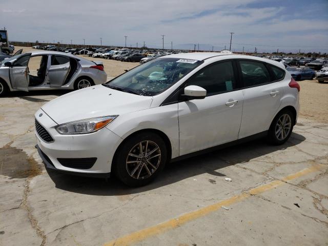 FORD FOCUS SE 2018 with VIN 1FADP3K21JL322522 - Photo from auction