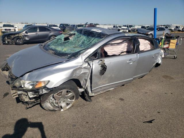 HONDA CIVIC LX 2010 with VIN 19XFA1F5XAE077239 - Photo from auction