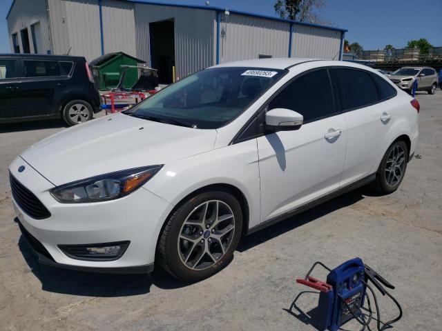 FORD FOCUS SE 2017 with VIN 1FADP3FE7HL284079 - Photo from auction