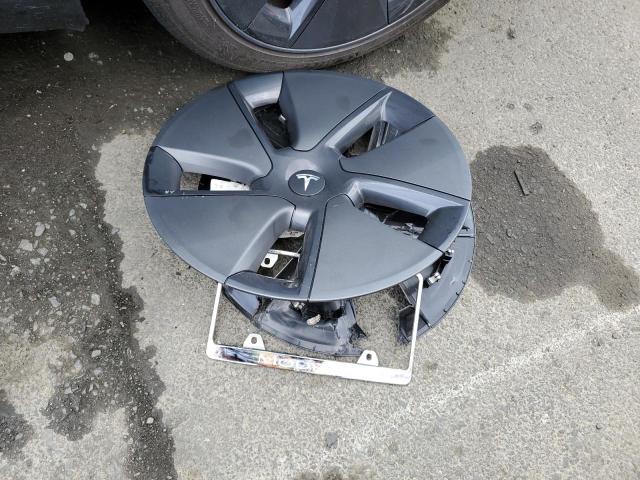 Photo 12 from auction – 2021 TESLA MODEL 3 with VIN 5YJ3E1EA3MF027321