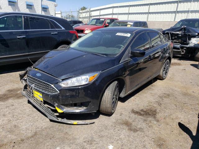 FORD FOCUS SE 2018 with VIN 1FADP3FE5JL244525 - Photo from auction