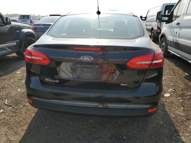 Photo 6 from auction – 2018 FORD FOCUS SEL with VIN 1FADP3H21JL228079