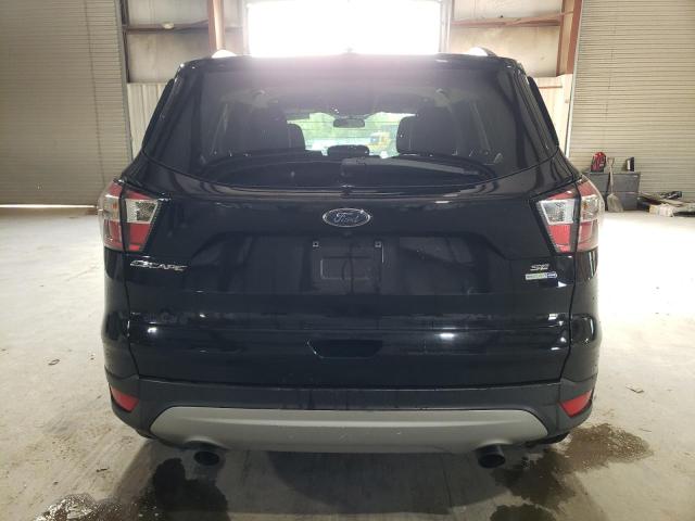 Photo 6 from auction – 2018 FORD ESCAPE SE with VIN 1FMCU9GD7JUB93574