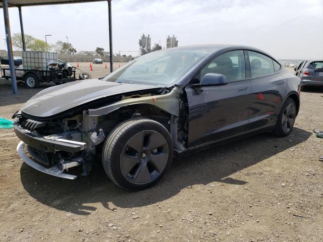 TESLA MODEL 3 2021 with VIN 5YJ3E1EBXMF014848 - Photo from auction