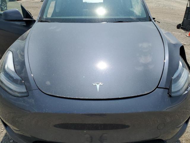 Photo 11 from auction – 2022 TESLA MODEL Y with VIN 7SAYGDEF4NF414669