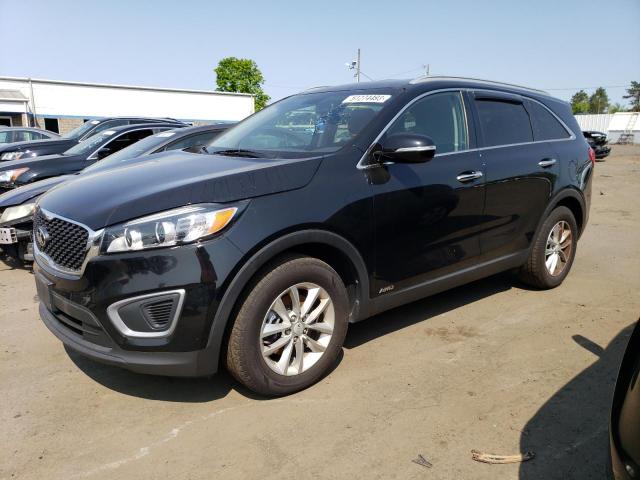 KIA SORENTO LX 2016 with VIN 5XYPGDA30GG153136 - Photo from auction
