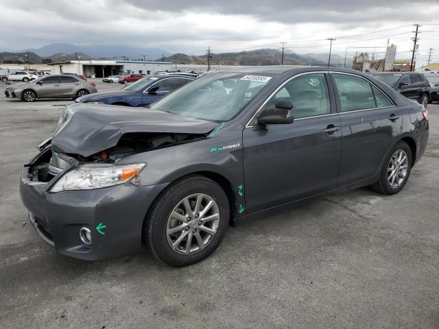 TOYOTA CAMRY HYBR 2011 with VIN 4T1BB3EK3BU129033 - Photo from auction