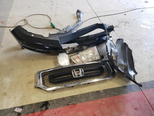 Photo 12 from auction – 2010 HONDA RIDGELINE with VIN 5FPYK1F27AB003757