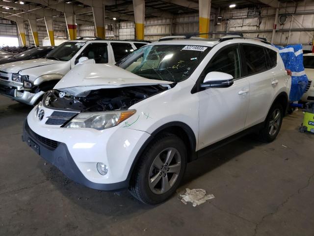 TOYOTA RAV4 XLE 2015 with VIN JTMRFREV3FD137904 - Photo from auction